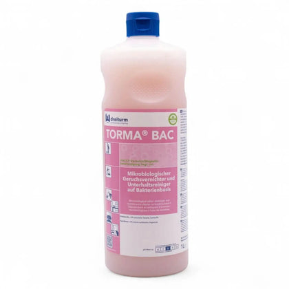 Rosa flüssiges reinigungsmittel in 1 liter flasche mit blauem verschluss und torma® bac etikett von dreiturm
