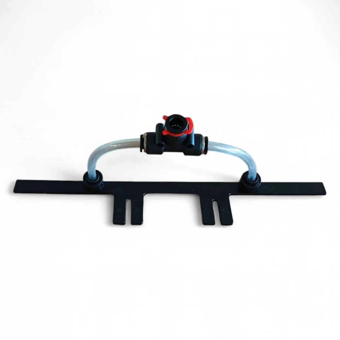 Black plastic drip irrigation emitter with transparent tubing and red valve for Gardiner Spül-Leiste rinsebar system
