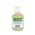 Eine klare glasflasche mit weißem verschluss enthält ein hellgelbes odor-neutralisierendes produkt aeron citrofresh stark aus deutschland