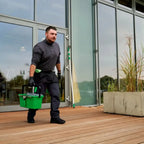 Grüner unger 12 liter eimer qb12b aus plastik mit schwarzem griff und silberner metallklammer